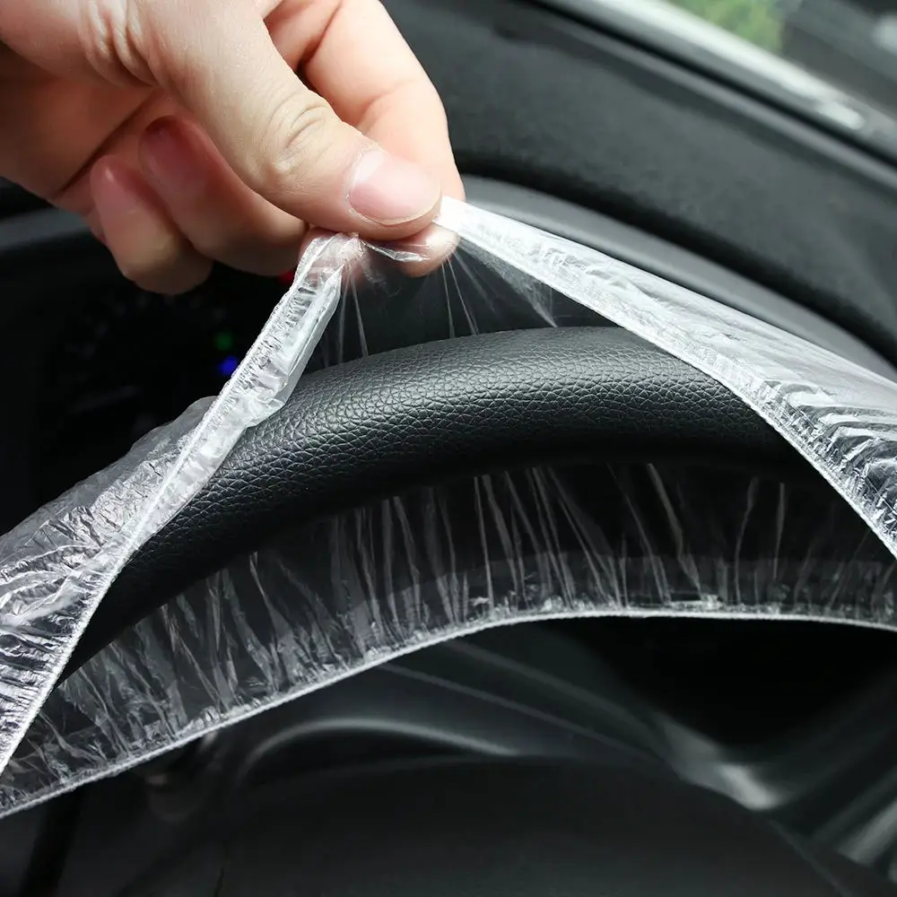 50pc Universal Car Gear Cover Disposable Transparent Steering Wheel Cover Elastic Waterproof Plastic Safety Isolation Protection thumbnail 4