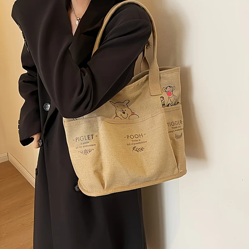 Winnie The Pooh Printed Canvas Tote Bag Retro Shoulder Bag Large Capacity Multi Pocket Light Handbag Student Commuter Bag thumbnail 5