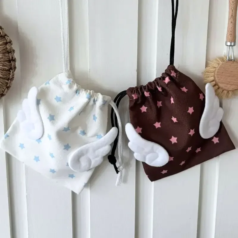 HOT Canvas Angel Wings Stars Makeup Bag INS Drawstring Storage Bag Portable Bundle Pocket Dustproof Storage Bag Organizer Bag thumbnail 2