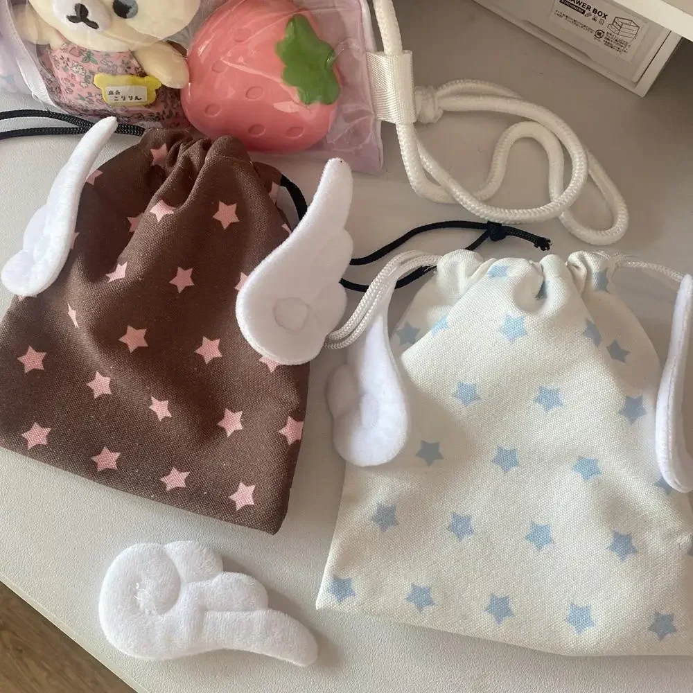 HOT Canvas Angel Wings Stars Makeup Bag INS Drawstring Storage Bag Portable Bundle Pocket Dustproof Storage Bag Organizer Bag thumbnail 6