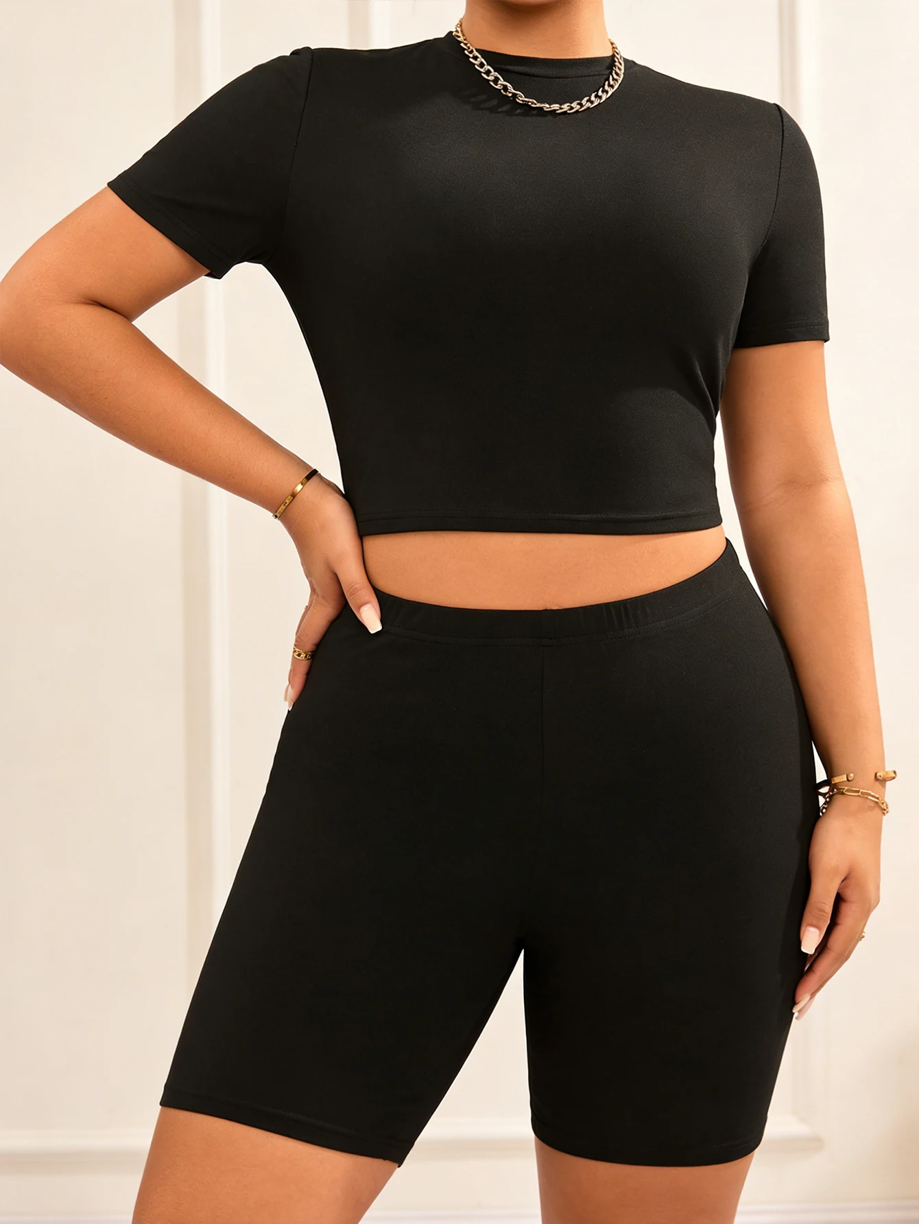 Plus-size women's fashionable casual short-sleeved top + tight shorts, a casual sports and comfortable set thumbnail 4