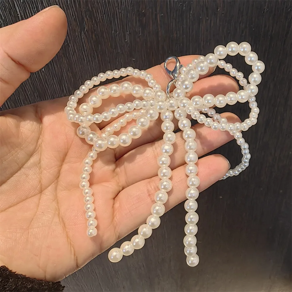 L-White pearl bow