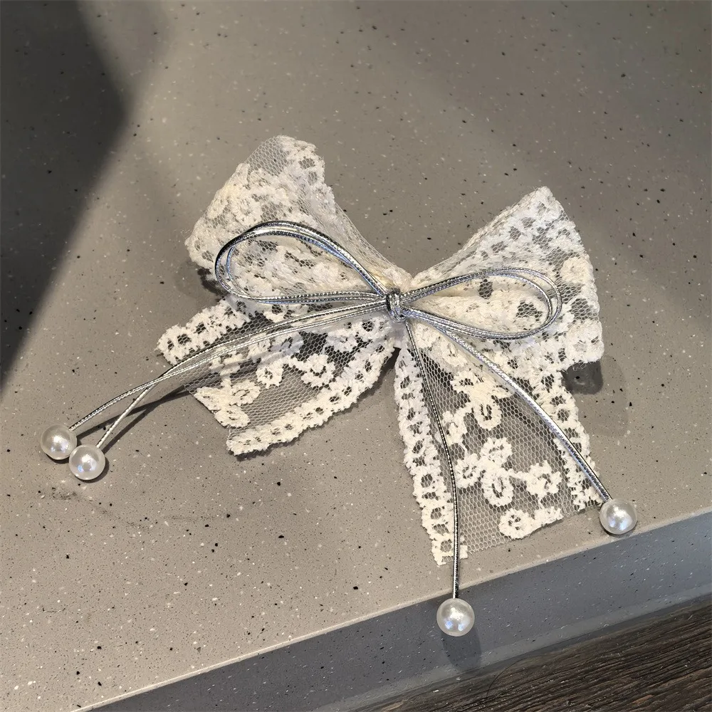 Silver lace bow