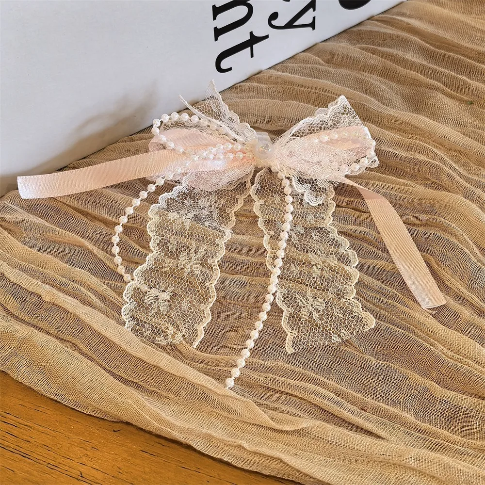 Pink pearl lace bow